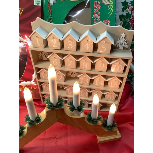 131 - Wooden advent calendar Santa window silhouette plus candle bridge light - all working