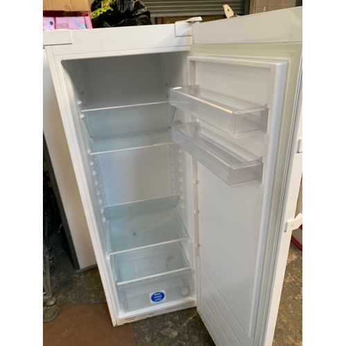 196 - Indesit tall standing fridge - working order - corrosion to the edges