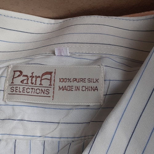 15 - A quantity of mens shirts some of which are 100% pure silk from Hong Kong. Some look unworn and some... 