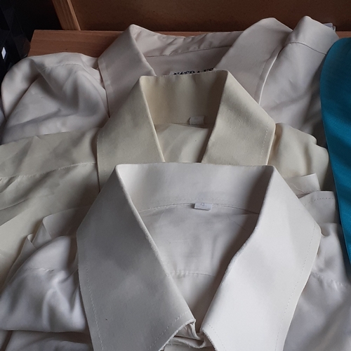 15 - A quantity of mens shirts some of which are 100% pure silk from Hong Kong. Some look unworn and some... 