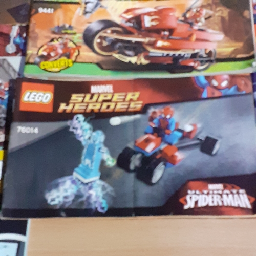 11 - A quantity of Lego instruction booklets, including Marvel Super Heroes. City, Speed etc