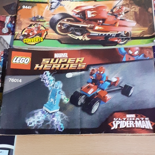 11 - A quantity of Lego instruction booklets, including Marvel Super Heroes. City, Speed etc