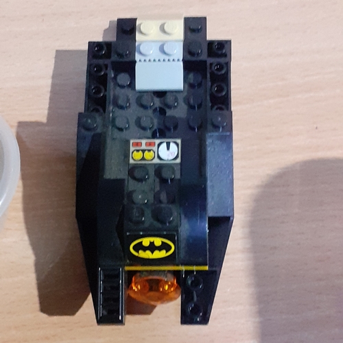 6 - Spare Lego wheels and axels etc with a part built batmobile. Pieces shown in pictures