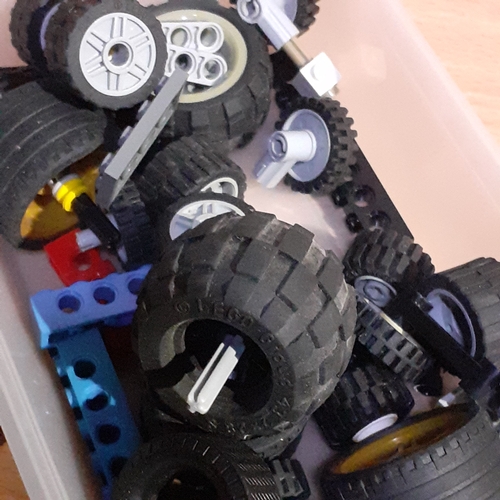 6 - Spare Lego wheels and axels etc with a part built batmobile. Pieces shown in pictures