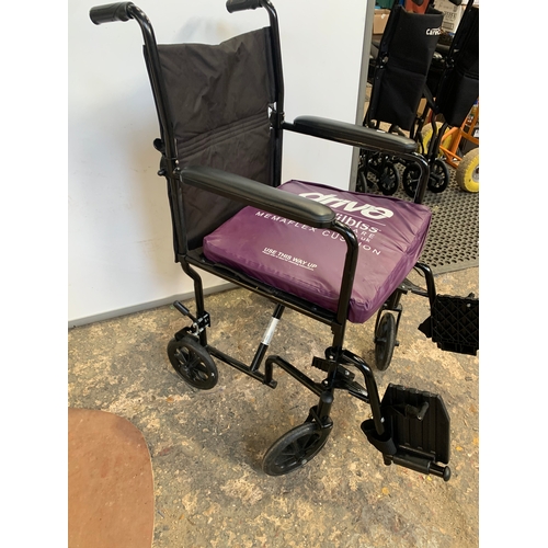 267 - Wheelchair in good condition with seat cushion