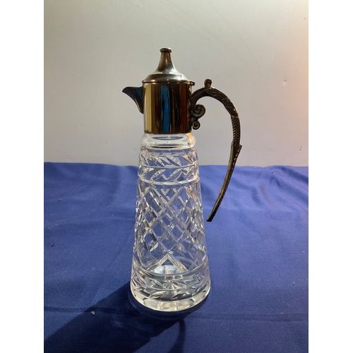 103 - Silver plated and glass claret jug