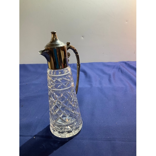 103 - Silver plated and glass claret jug