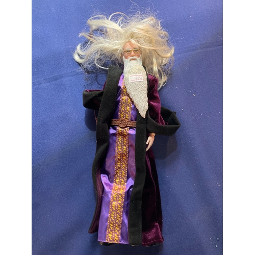 140 - Harry Potter figures Dumbledore,  Malfoy and Harry Potter with wands