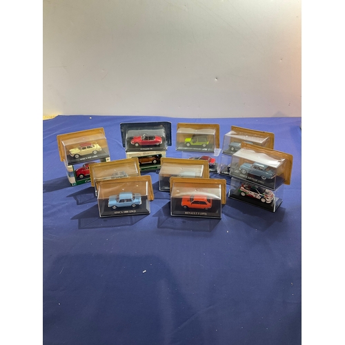 153 - 14 boxed Diecast vehicles including Citroen 2CV, Toyota Corolla, Simca Aronde and more