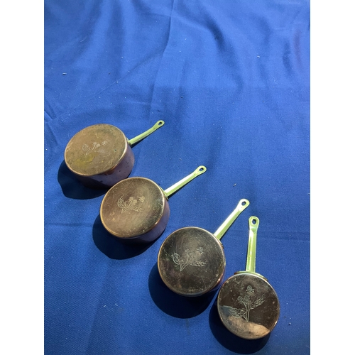 162 - Set of brass and copper measuring cups