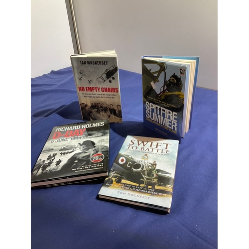 205 - 4 war related hard back books including Spitfire Summer, No empty chairs , Swift to Battle and D-DAY... 