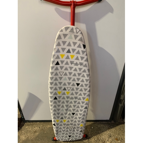 549 - Minky ironing board in good condition