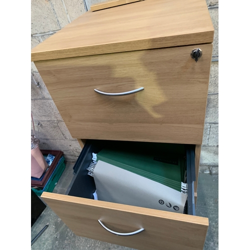 560 - 4 drawer filing cabinet with key