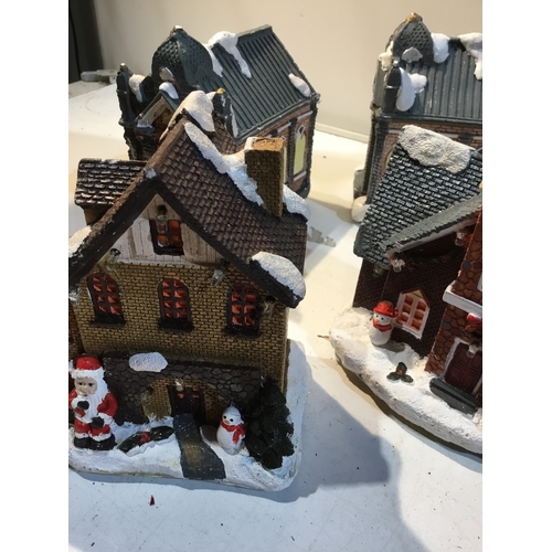 178 - Quantity of battery operated small winter scene houses