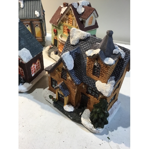 178 - Quantity of battery operated small winter scene houses