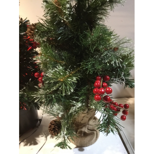 196 - Trio of small artificial table Christmas trees