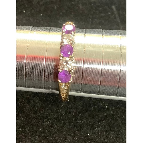 27 - 9ct gold ring with clear stone & believed to be amethyst - size S - 2.02g