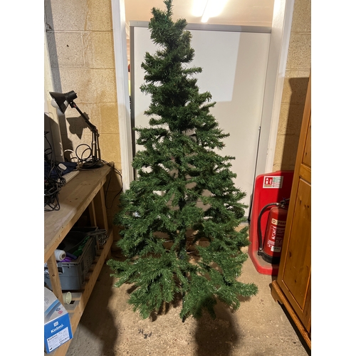 235 - 6ft tall artificial green Christmas tree with stand