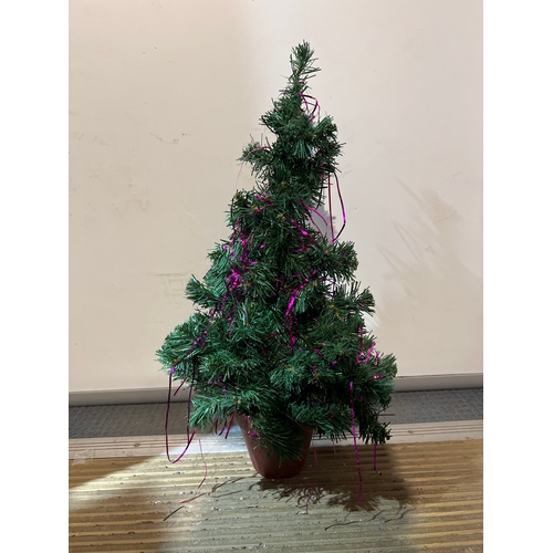 236 - 60cm tall ariticial tree with purple tinsel