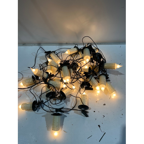 243 - Set of melting candle string lights - working