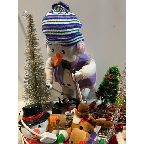 247 - Quantity of Christmas decorations inc skiing snowman, snowman plush, metal trees and more