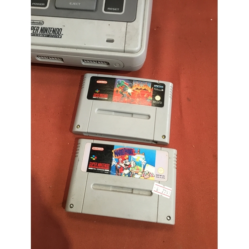 67 - Nintendo SNES console with Mario Paint and Doom games