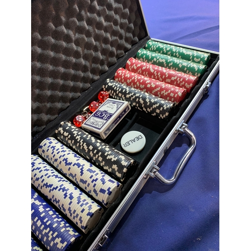 246 - Two poker chip sets in large travel cases