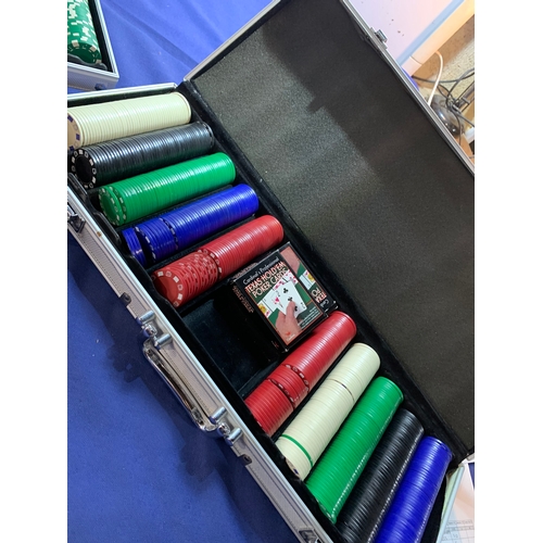 246 - Two poker chip sets in large travel cases