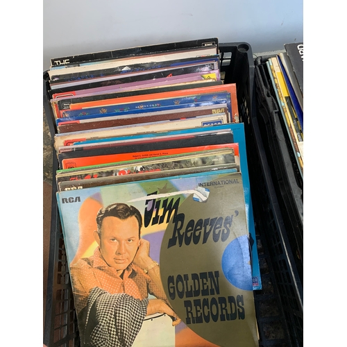 247 - Two trays of mixed genre and ages vinyl records