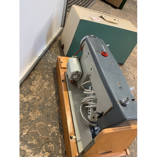 249 - Vintage new home sewing machine with case