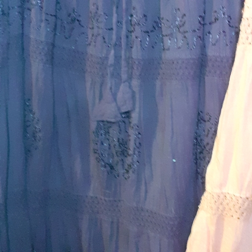 14 - 2 plus size skirts with embroidered style pattern in very good condition.