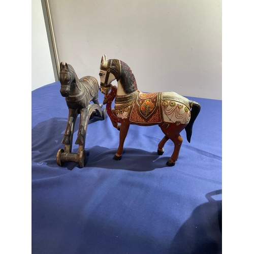 101 - 2 wooden decorative horses one with brass detailing