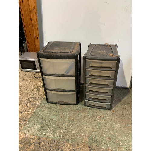 572 - Two plastic storage drawers