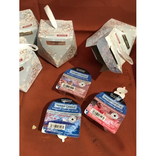 123 - Three boxes of 3 Yankee candle wax melts and one box with Two Sakura blossom festival