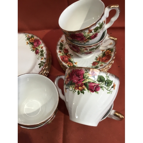 228 - English Rose by ironstone Washington Pottery Ltd Hanley England 6 x cups, saucers and 6” side plates