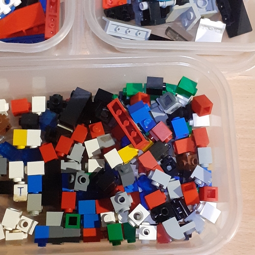 11 - Three tubs with hundreds of spare, genuine lego pieces