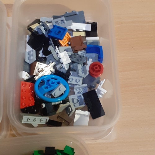 11 - Three tubs with hundreds of spare, genuine lego pieces