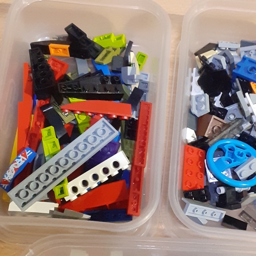 11 - Three tubs with hundreds of spare, genuine lego pieces