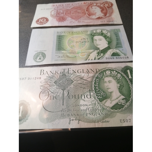 23A - 3 x old English banknotes 2 x 1 pound notes and a 10 shillings note all in excellent condition