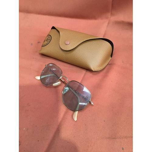 28 - Genuine pair of Ray Bans with leather case