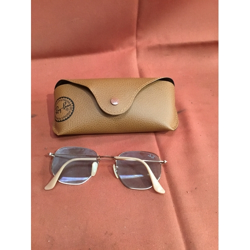 28 - Genuine pair of Ray Bans with leather case