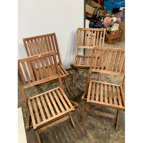 151 - 4x folding teak wooden garden chairs