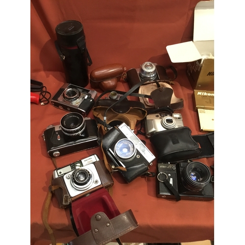 157 - Quantity of vintage cameras inc Canon, Optima, Zenit EM and more