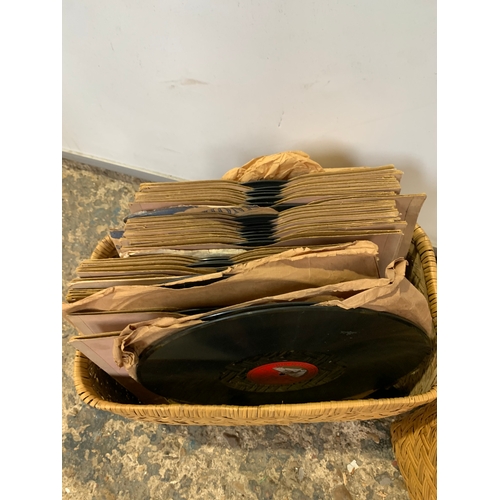 218 - Quantity of vintage gramophone vinyl records in wicker storage