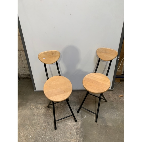 300 - Pair of metal and wood pop up chairs