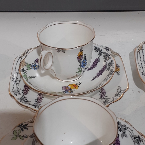 17A - Attractive Melba English Bone China Teaset. 6 Trios, Milk and Sugar and cake plates. Good clean, und... 