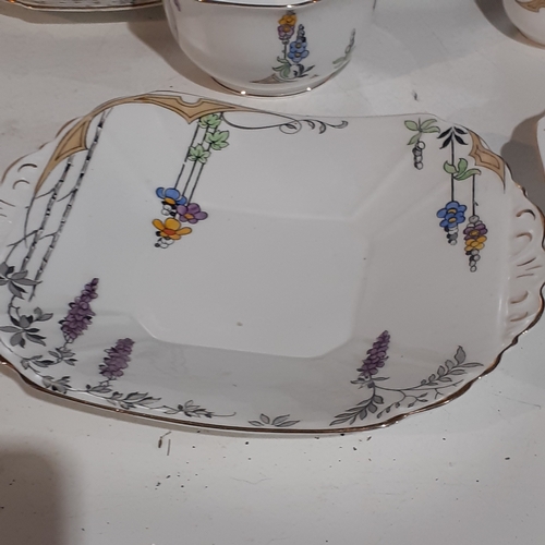 17A - Attractive Melba English Bone China Teaset. 6 Trios, Milk and Sugar and cake plates. Good clean, und... 