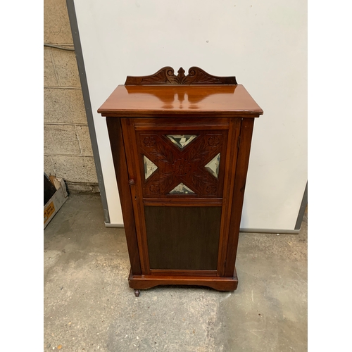 464 - Ornately carved storage cabinet in very clean condition