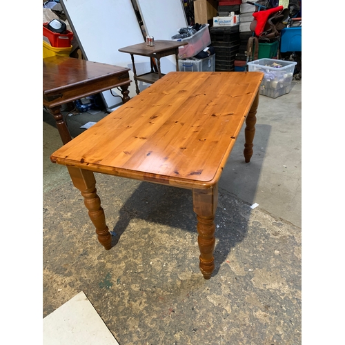 466 - Waxed pine dining table in good condition - 150x80cm