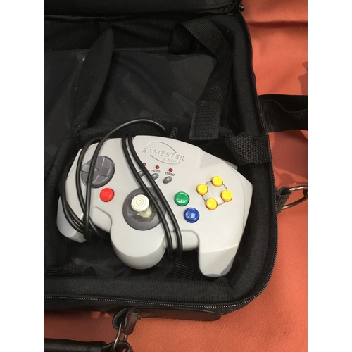 187 - Nintendo 64 bag with Gamester LMP controller and a selection of Nintendo 64 games to include War zon... 